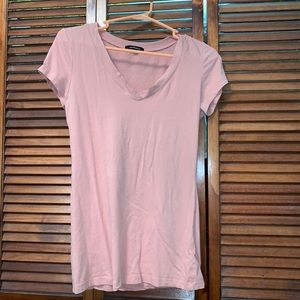 V neck tee. It says large but it fits like M or S